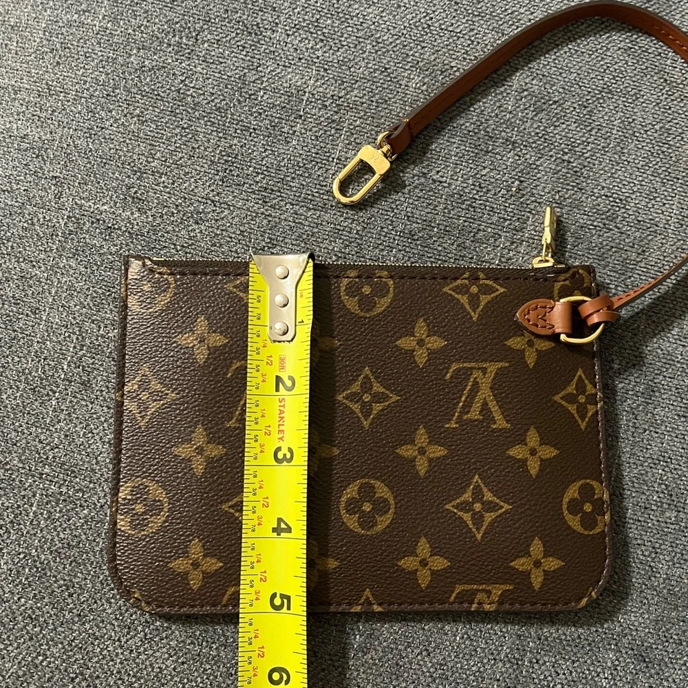 Louis Vuitton monogram zippy pouch wristlet